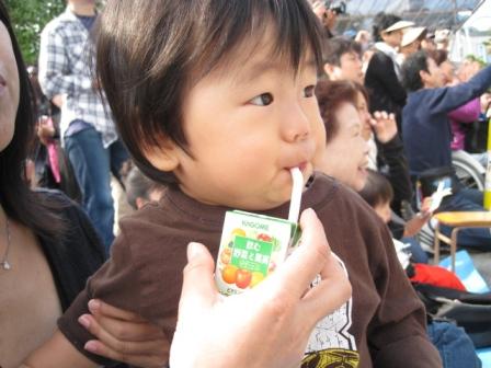 My son is drinking juice