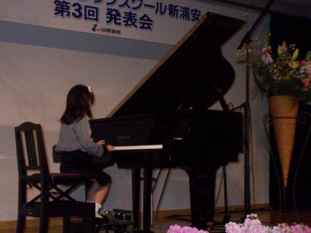 She is playing the piano